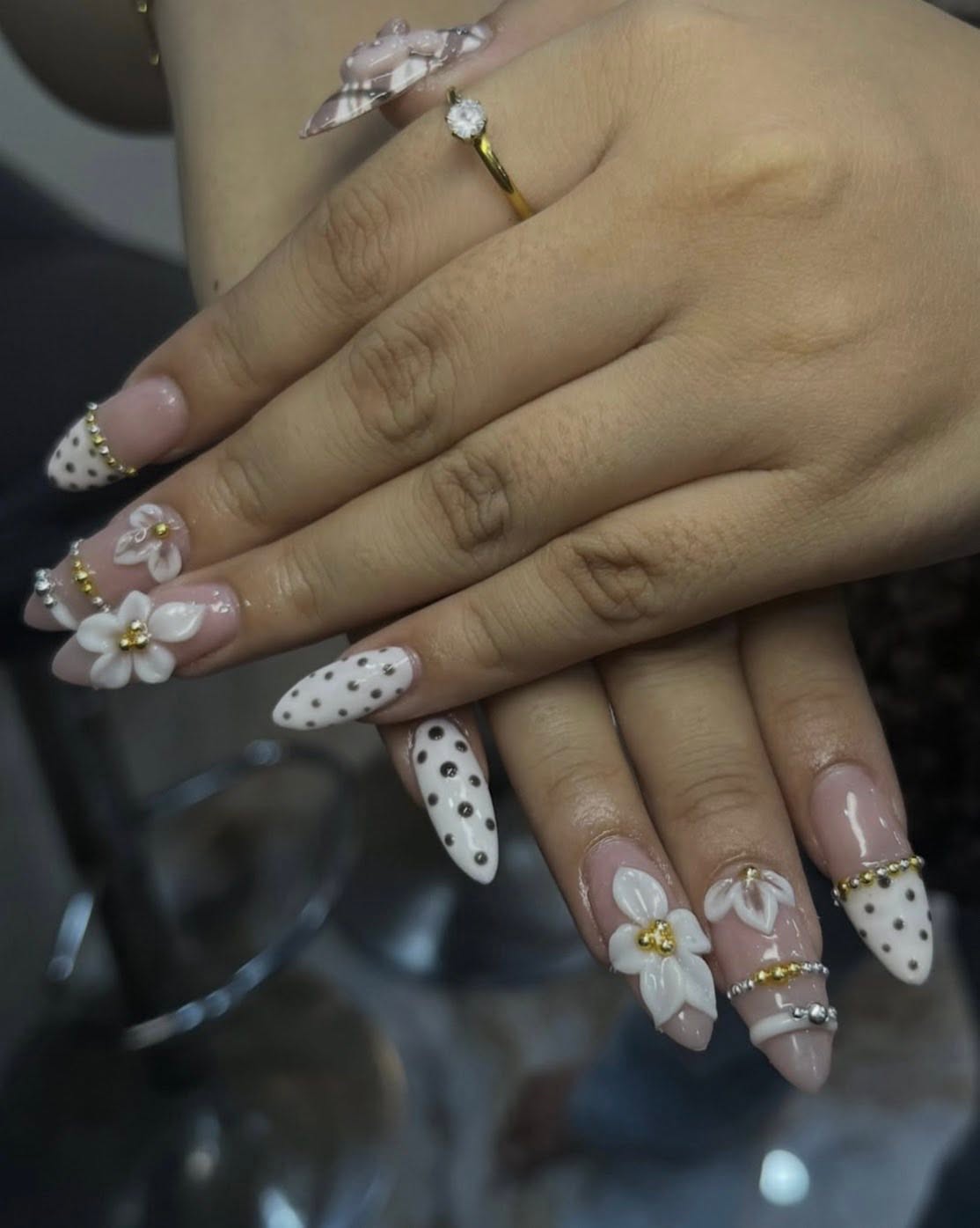 Custom nail design post on Claws and Blooms Instagram